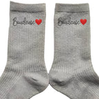 Chaussettes paillettes argent motif boudeuse