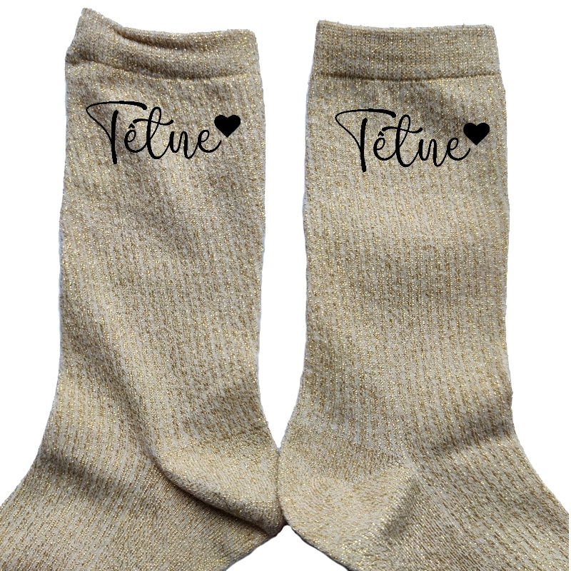 Chaussettes paillettes doré motif tëtue