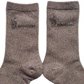 Chaussettes paillettes bronze motif lumineuse