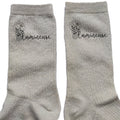 Chaussettes paillettes crème motif lumineuse